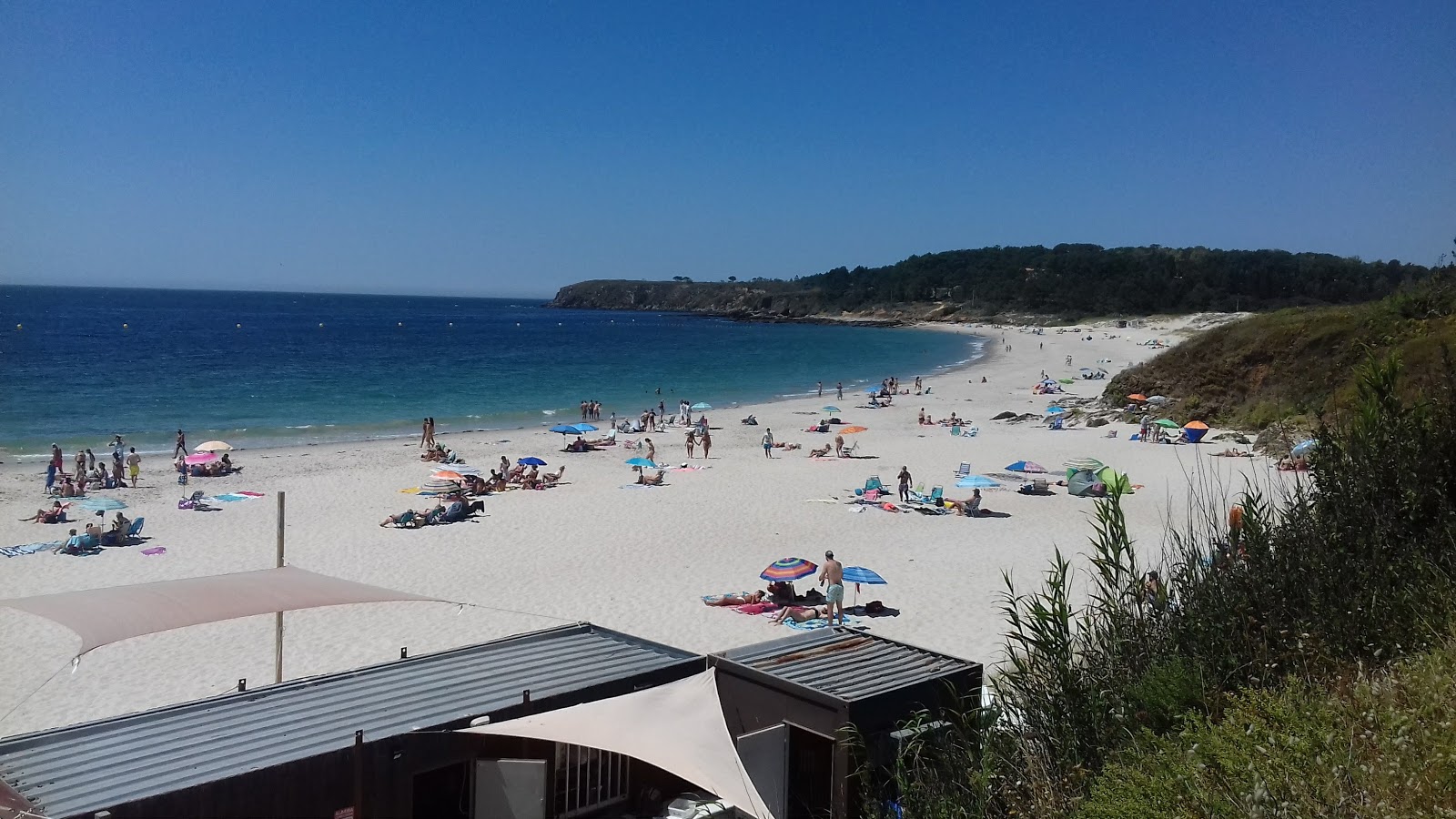 Zdjęcie Pragueira beach z powierzchnią biały drobny piasek