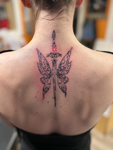 Explore leg tattoo cover up ideas for men, creative tattoo ideas in Elizabethtown, available at Electric Feel Tattoos