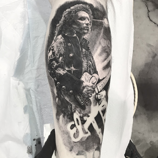 Explore song lyric tattoo ideas, creative tattoo ideas in Chicago, available at Master Craft Tattoo Co.