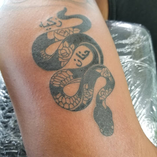 Explore tattoo ideas for swimmers, creative tattoo ideas in Keyport, available at Taboo Tattoos