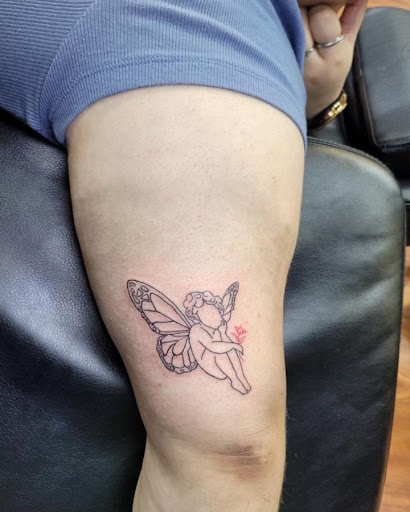 Explore black mamba tattoo ideas, creative tattoo ideas in Cocoa, available at Rorschach Tattoo Shop and Piercing Studio