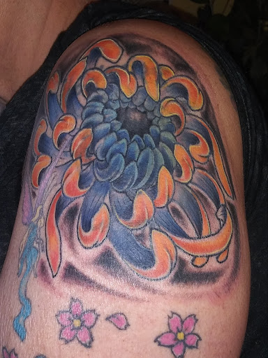 Explore green bay packers tattoo ideas, creative tattoo ideas in Geneva, available at Amazing Grace Tattoo & Piercing