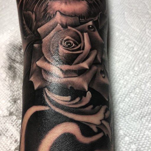 Explore compass tattoo ideas, creative tattoo ideas in Junction City, available at New Era Tattoo Studio