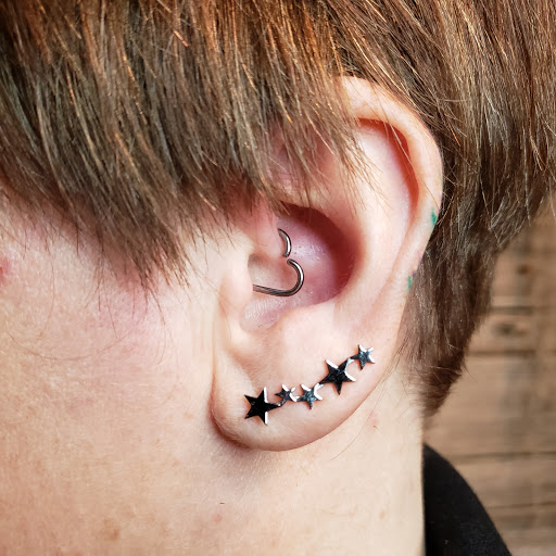 Explore whiskey tattoo ideas, creative tattoo ideas in Kansas City, available at Supernatural Body Piercing