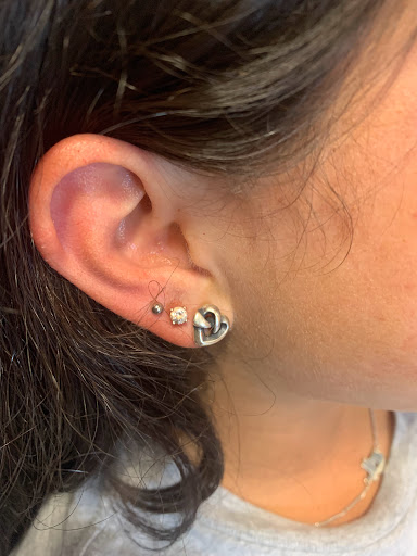 Find tattoo necklace ideas for your next unique tattoo in Round Rock at Piercings by Toni