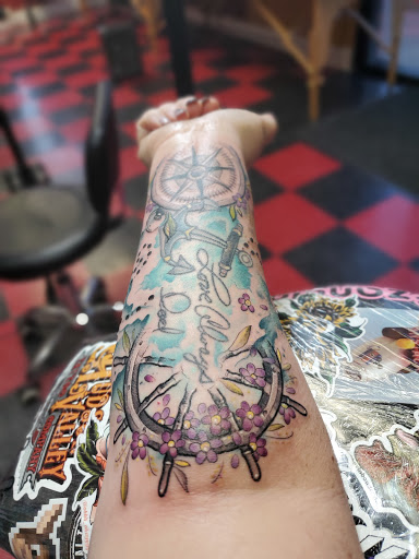 Explore hawk tattoo ideas, creative tattoo ideas in Albany, available at Make Your Mark Tattoo