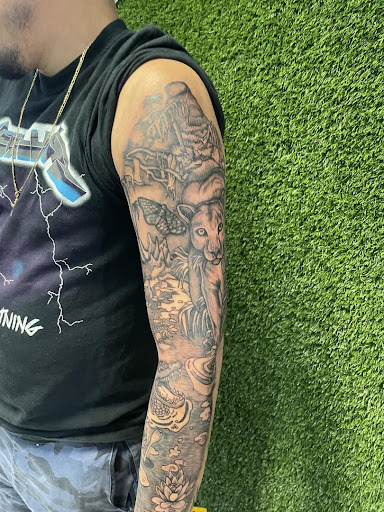 Explore damaged tattoo ideas, creative tattoo ideas in Cocoa, available at Rorschach Tattoo Shop and Piercing Studio