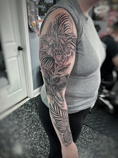Explore photographer tattoo ideas, creative tattoo ideas in Fort Myers, available at Loyal 2 The Coil Tattoos & Piercings (Edison Mall Location Entrance F)