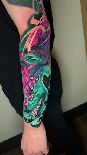 Explore universe tattoo ideas, creative tattoo ideas in Lakeville, available at SharkTooth Tattoo & Gallery