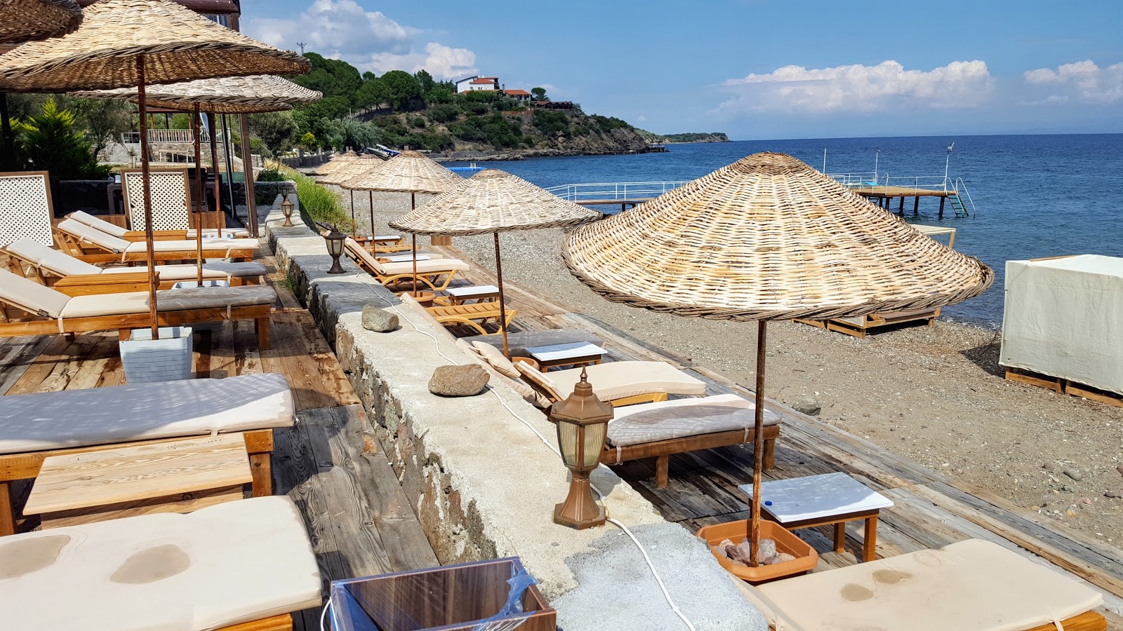 Photo of Duru camping beach with light sand &  pebble surface