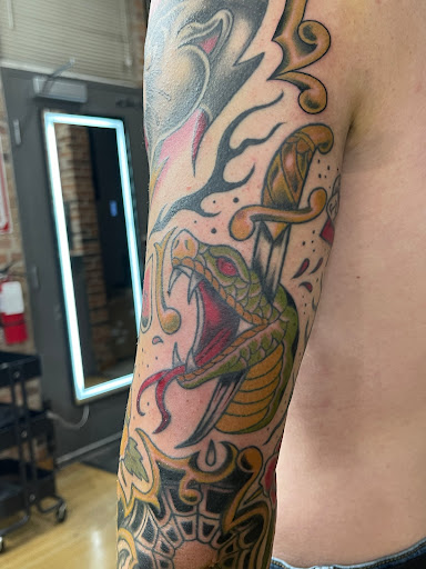 Explore half sleeve memorial tattoo ideas, creative tattoo ideas in Albuquerque, available at Blacklist Tattoo Parlour Tattoo Shop in Albuquerque