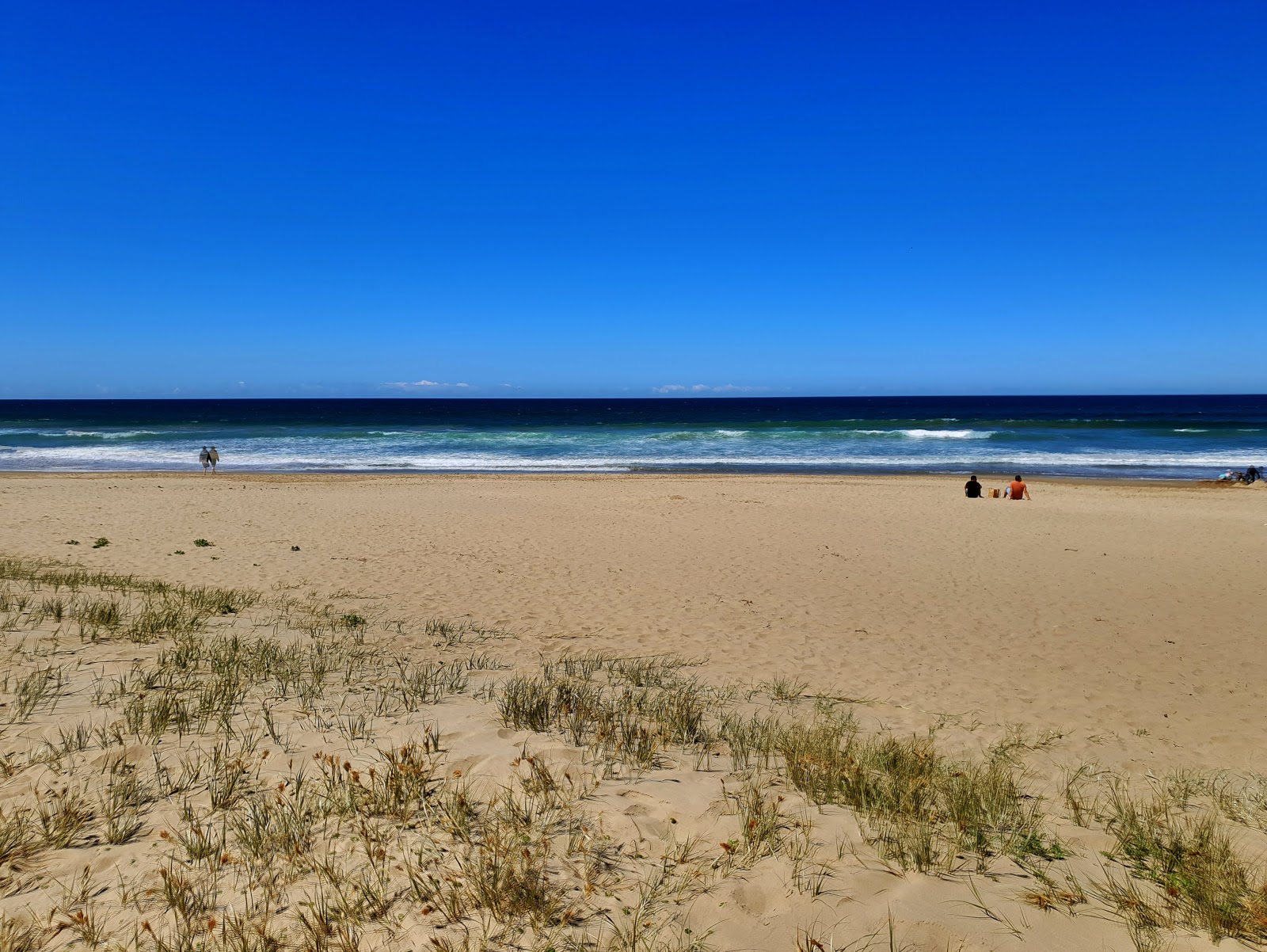 Foto de Seven Mile Beach - lugar popular entre os apreciadores de relaxamento