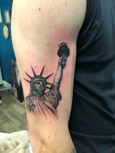 Find lipstick tattoo ideas for your next unique tattoo in Buford at Wild Tribe Tattoos and Piercings