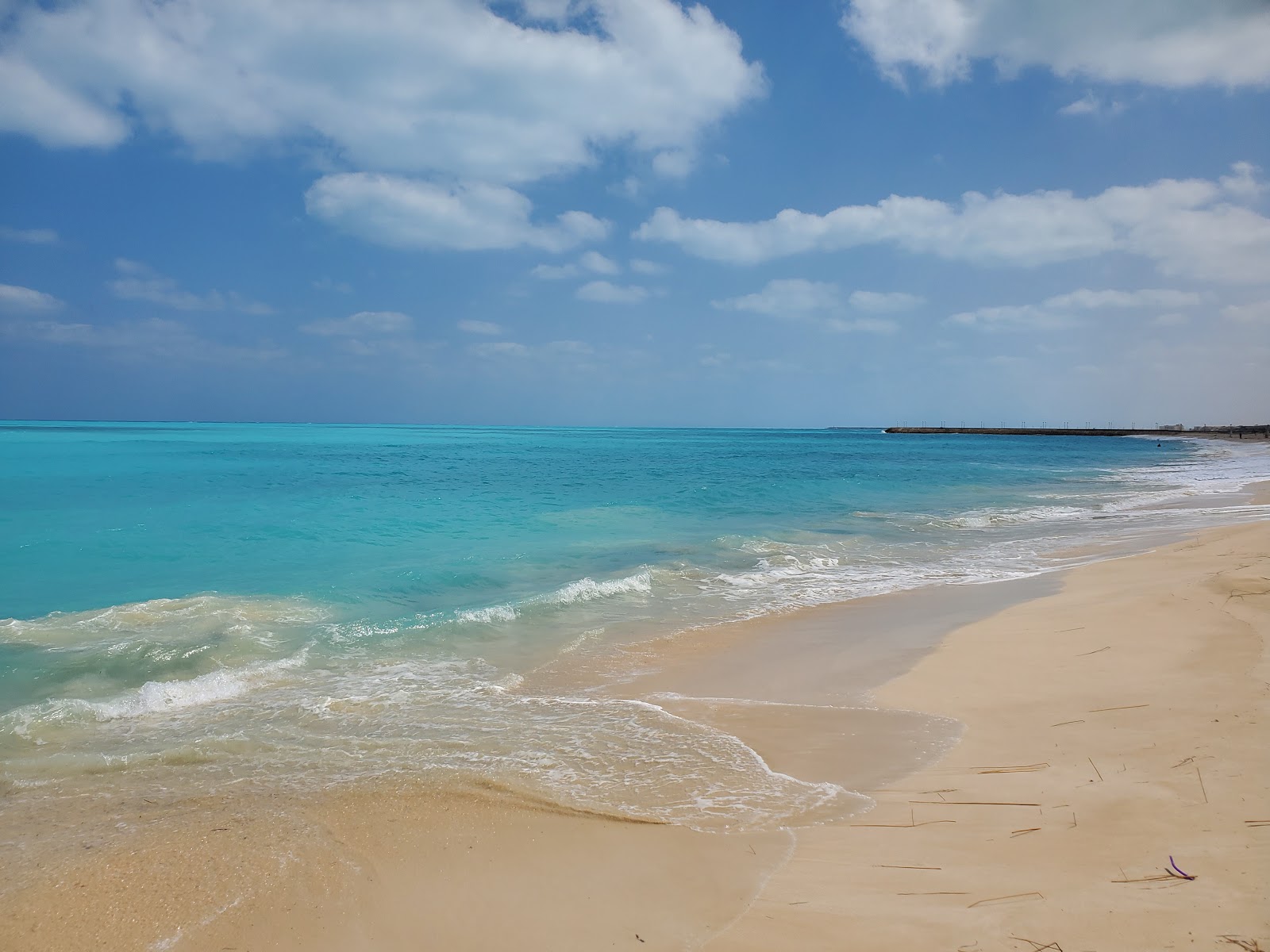 Photo of La Femme Beach with turquoise pure water surface