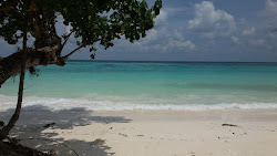Photo de Punte Malaka Beach et ses beaux paysages
