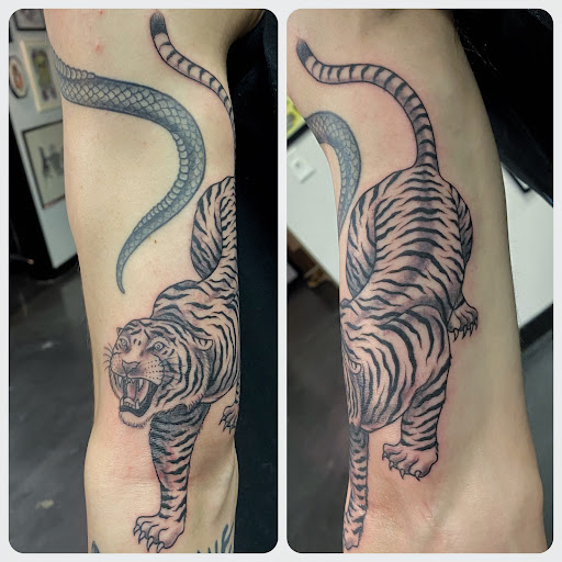 Explore tattoo ideas for two sons, creative tattoo ideas in Raleigh, available at Raleigh Tattoo Company