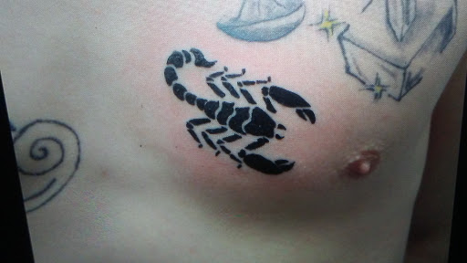 Explore quad tattoo ideas, creative tattoo ideas in Lima, available at White Wizard Tattoo & Body Piercing