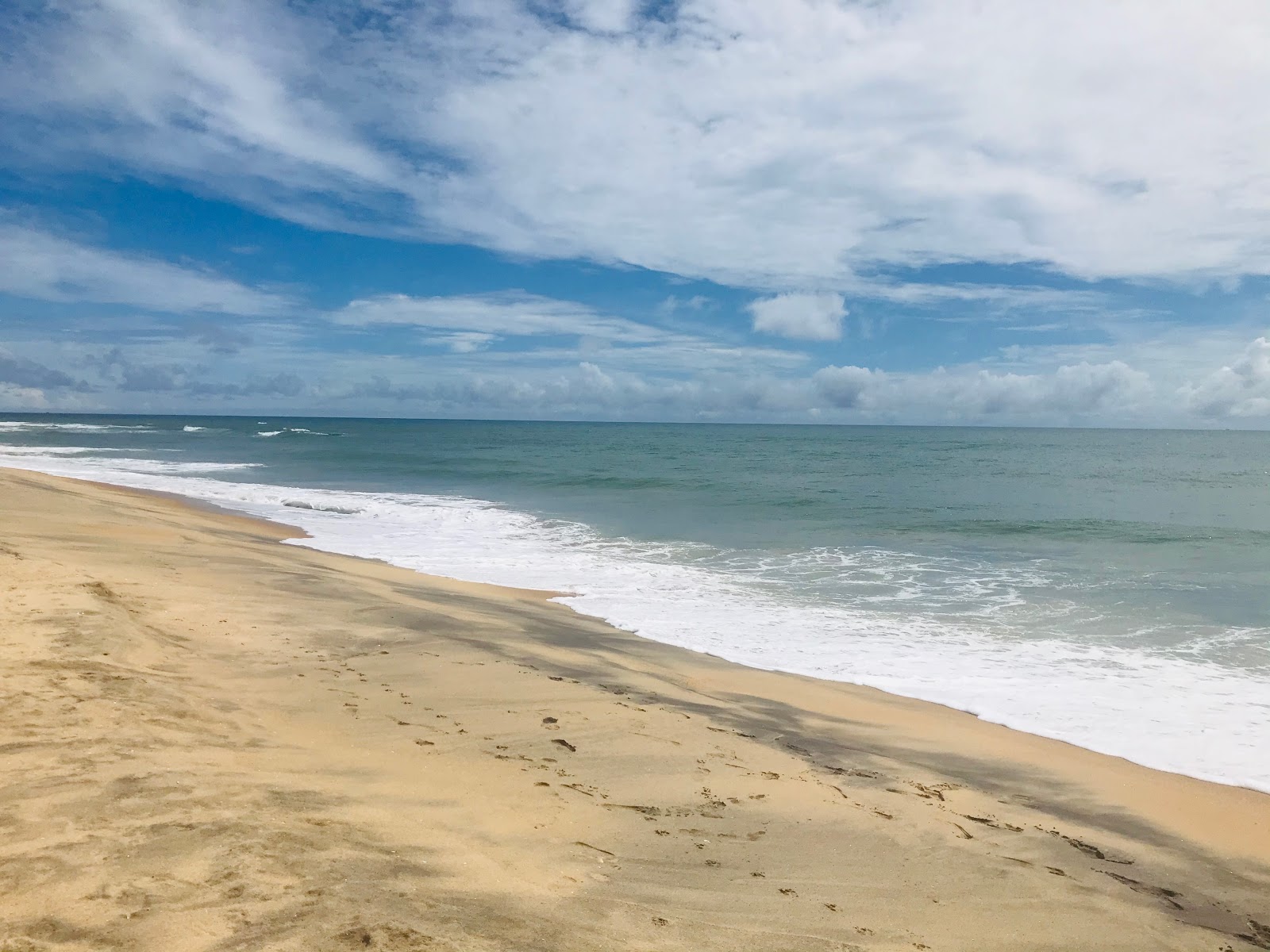 Fotografija Pasarichenai Beach z dolga ravna obala