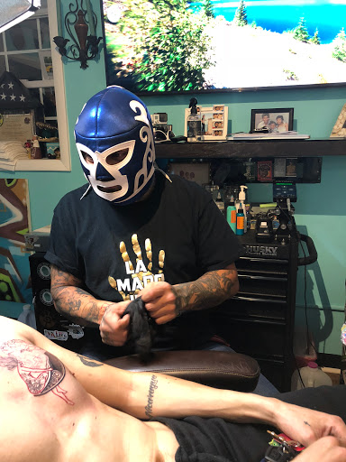 Explore cat tattoo ideas for guys, creative tattoo ideas in Manassas, available at Lamano Ink