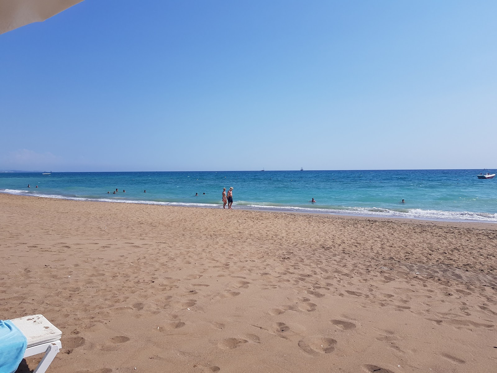 Camici beach'in fotoğrafı düz ve uzun ile birlikte