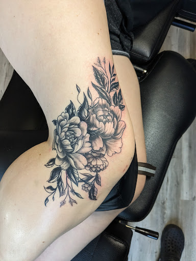 Explore thigh tattoos ideas, creative tattoo ideas in East Rochester, available at Spice City Tattoo