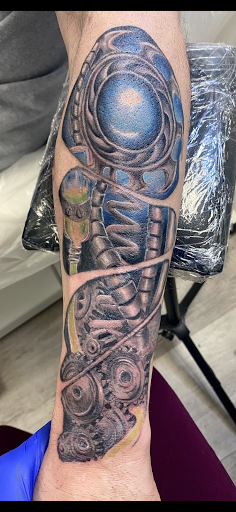 Explore radiohead tattoo ideas, creative tattoo ideas in Jersey Shore, available at Camellas Ink House