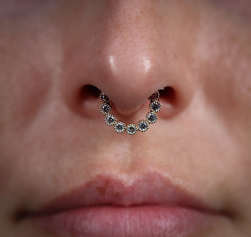 Explore tattoo ideas for the back of the neck, creative tattoo ideas in West Palm Beach, available at Wooden Heart Tattoos and Piercings