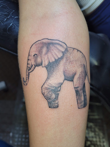 Explore girly tattoo sleeve ideas, creative tattoo ideas in Angola, available at Hoodlum Ink