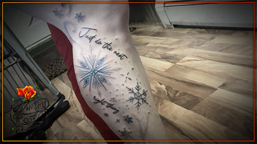 Explore barber pole tattoo ideas, creative tattoo ideas in Minocqua, available at Whisky Rose Tattoo Parlor