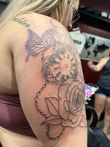 Explore morticia and gomez tattoo ideas, creative tattoo ideas in Cape Coral, available at UNRIVALED INK