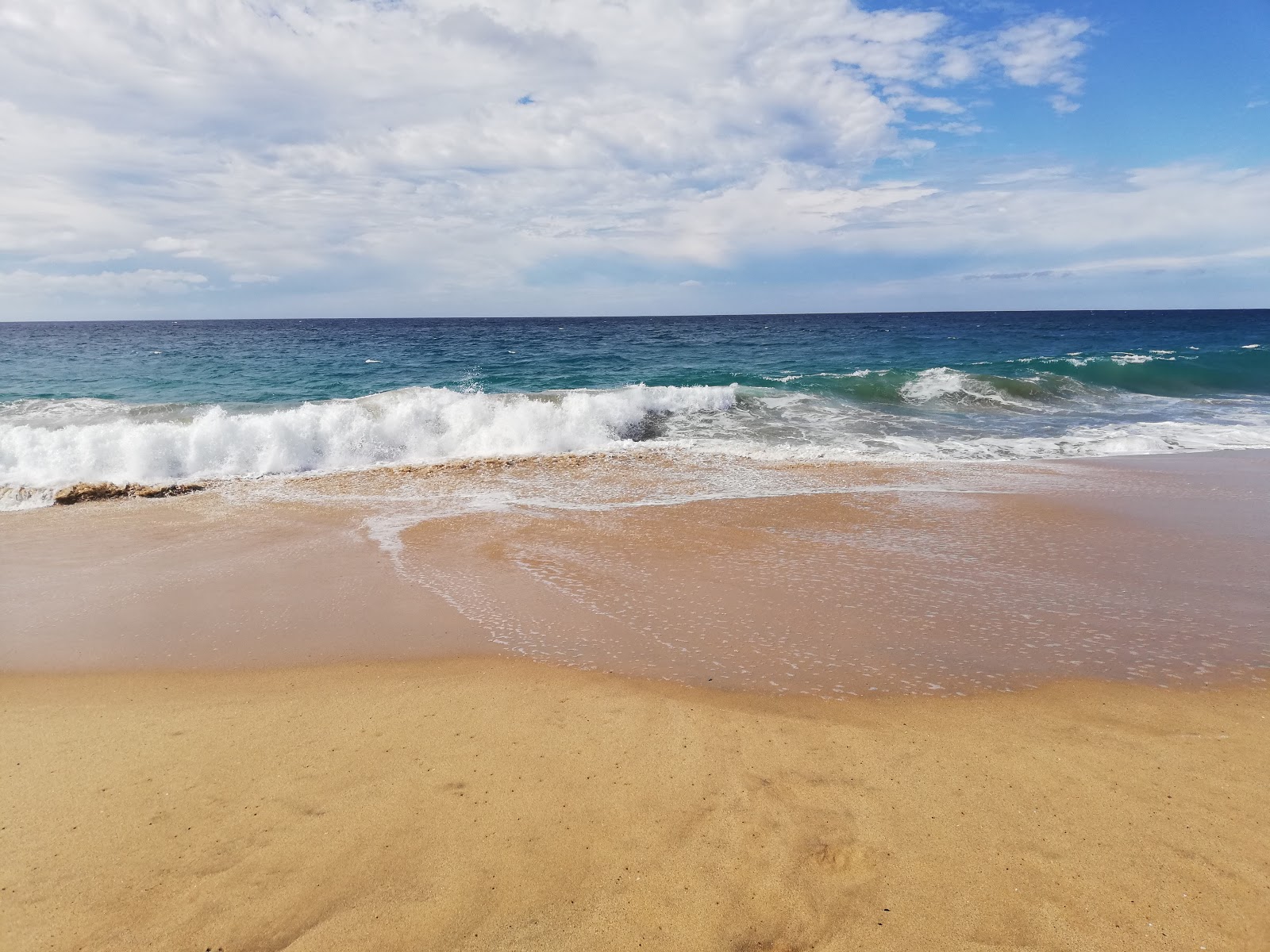 Foto av Playa la Pastora med turkos rent vatten yta