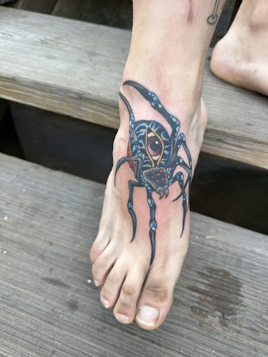 Explore frozen tattoo ideas, creative tattoo ideas in Erie, available at Wayward Tattoo Studio
