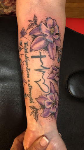 Explore lotus flower tattoo ideas, creative tattoo ideas in Kingston, available at Innovative Ink Tattoo & SMP