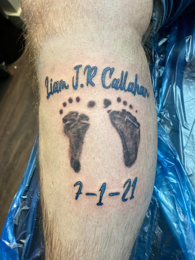 Explore fist tattoo ideas, creative tattoo ideas in Warrensburg, available at Altered Visions Tattoo Studio