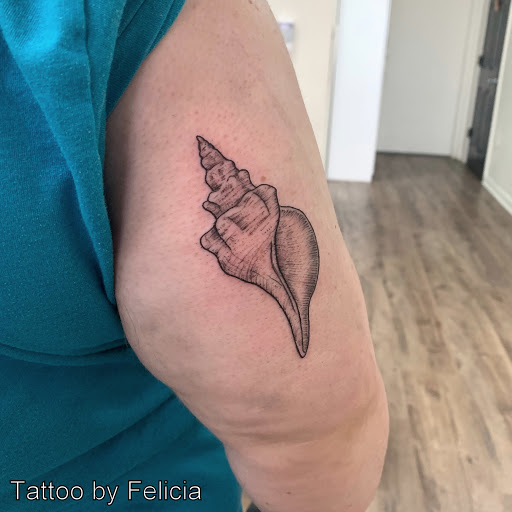 Explore finger hand tattoo ideas, creative tattoo ideas in Fort Myers, available at Tiger Lotus Tattoo and Piercing