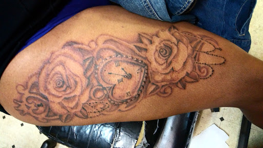 Explore tattoo ideas with son's name, creative tattoo ideas in Detroit, available at Swagg Shop (tattoos and piercings)