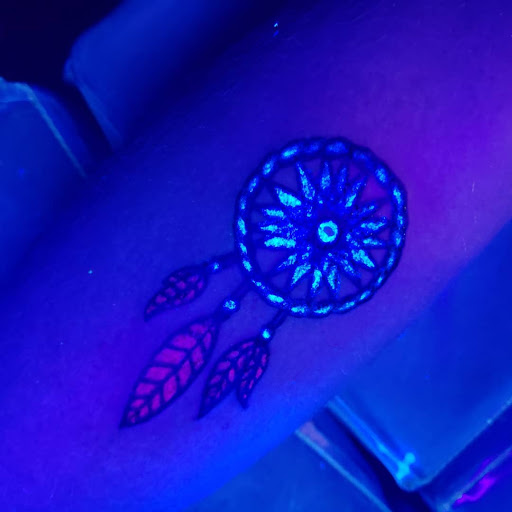 Explore side hand tattoo ideas, creative tattoo ideas in Erie, available at EliKingInk