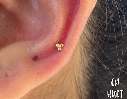 Explore name cover up tattoo ideas for men, creative tattoo ideas in Garden Grove, available at CM Hurt Piercing & Jewelry