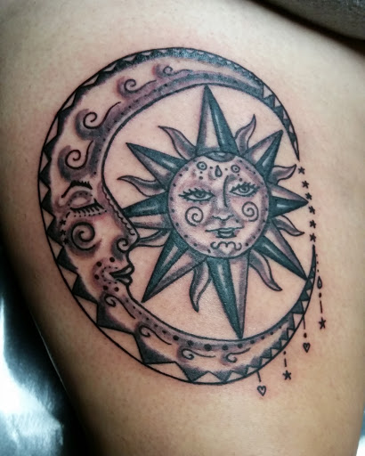 Explore wrap around tattoo ideas, creative tattoo ideas in Erie, available at EliKingInk