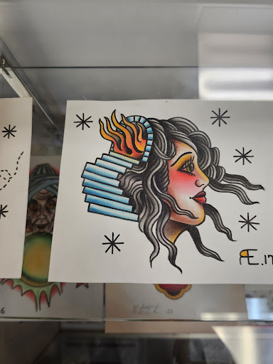 Explore august birth flower tattoo ideas, creative tattoo ideas in Media, available at Baker Street Tattoo