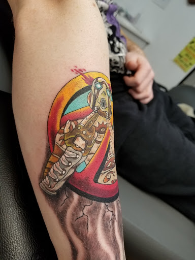 Explore back of the arm tattoo ideas, creative tattoo ideas in Georgetown, available at Body Art Tattoos