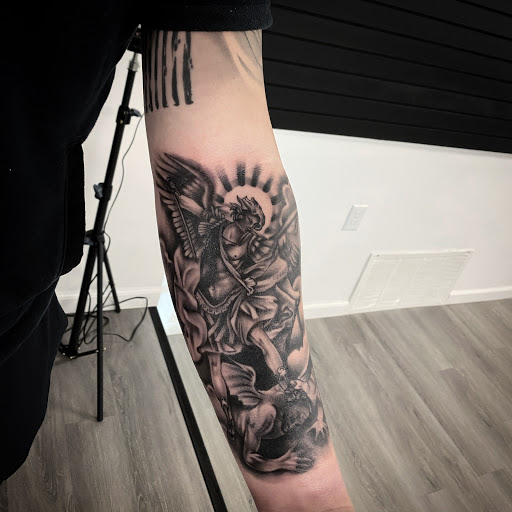 Explore mom and son tattoo ideas, creative tattoo ideas in Belleville, available at Dark Horse Tattoo Company, LLC