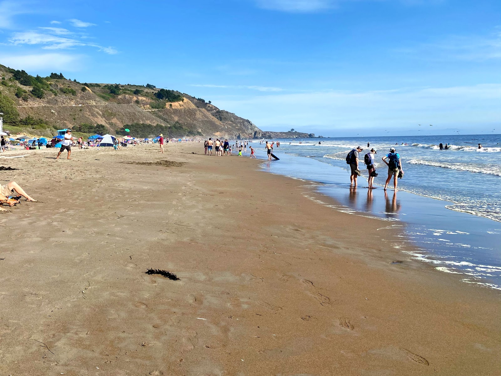 Photo of Stinson Beach with blue pure water surface