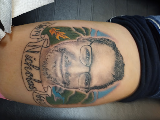 Find tattoo ideas for tummy tuck scars for your next unique tattoo in Fullerton at EngineerInk Tattoo & Body Piercing