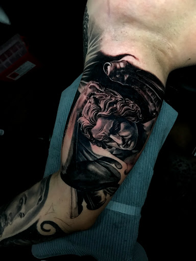 Explore narrow tattoo ideas, creative tattoo ideas in Oklahoma City, available at Oklahoma Tattoo Collective