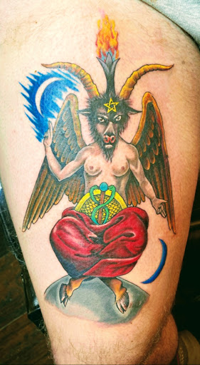 Explore cool hand tattoo ideas, creative tattoo ideas in Mountain Home, available at Kustom Kreature Tattoo Studio