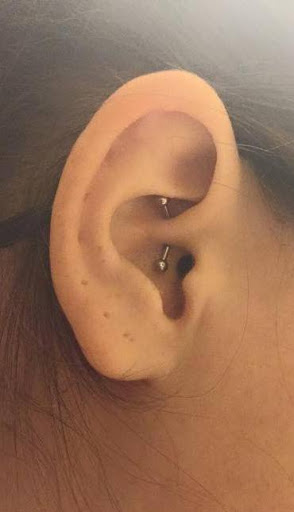 Explore last name back tattoo ideas, creative tattoo ideas in Wilmington, available at For the Love of Ink, Tattoos and Body Piercing