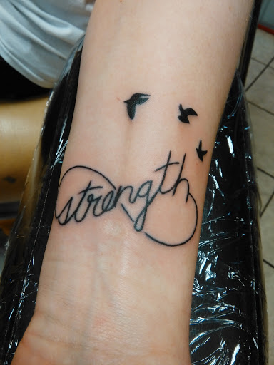 Tattoo Shop «Merritt Tattoos», reviews and photos, 218 N Main St, London, KY 40741, USA