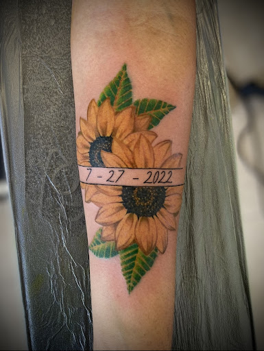 Explore cross tattoo sleeve ideas, creative tattoo ideas in Lafayette, available at Blasted Tattoos