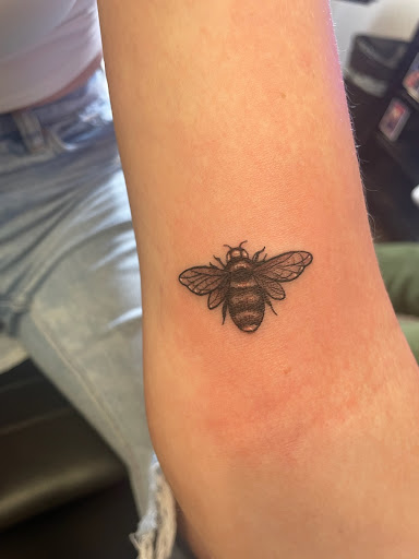 Find cool armband tattoo ideas for your next unique tattoo in Davenport at Fine Ink Studios Tattoos